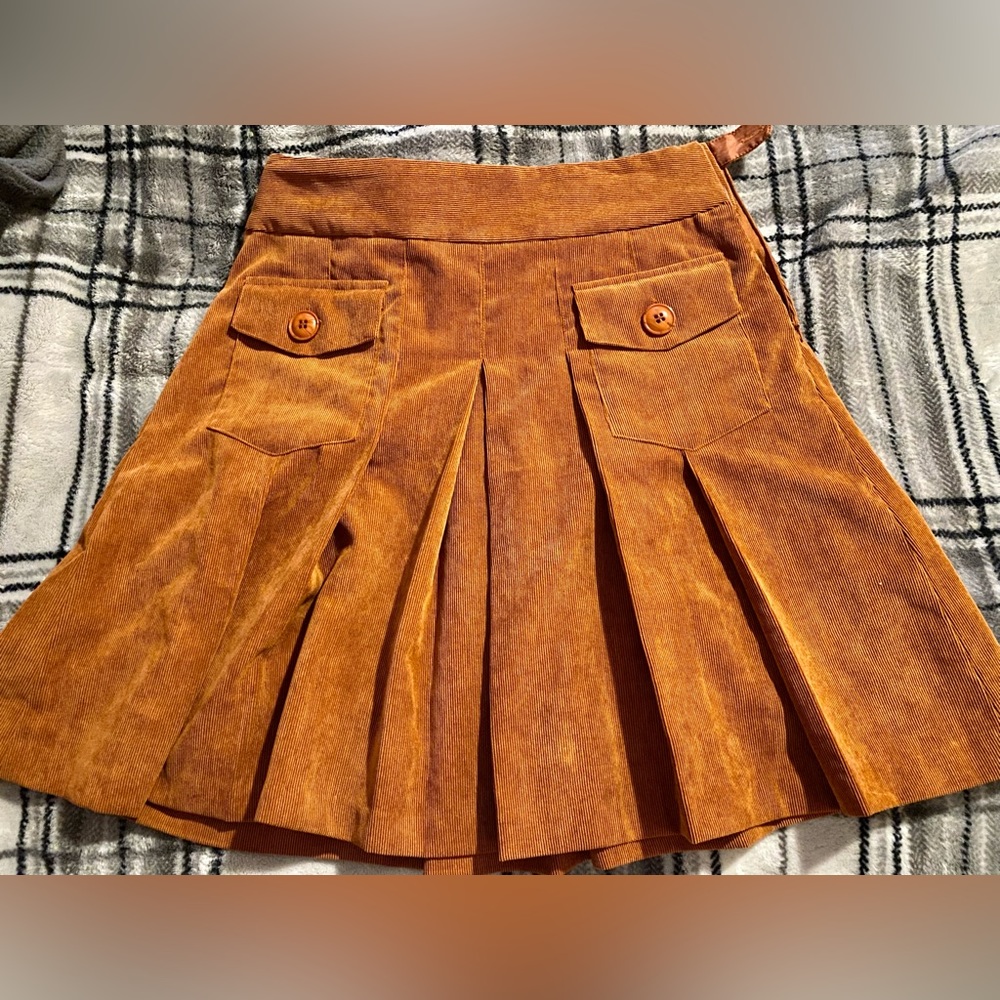 Rust colored front pocket corduroy skirt